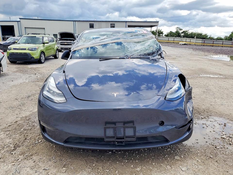 2021 Tesla Model y VIN 5YJYGDEE4MF062616 COPART salvage auction — ALL OVER, MN - CERTIFICATE OF TITLE (P), sold $6,900 on 2026-07-28 (photo 5)