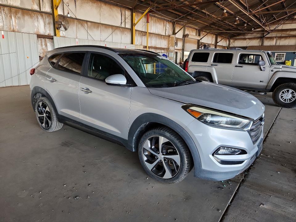 2016 Hyundai Tucson VIN KM8J33A2XGU091869 COPART salvage auction — MECHANICAL, Az - Certificate Of Title, sold $975 on 2026-07-27 (photo 4)