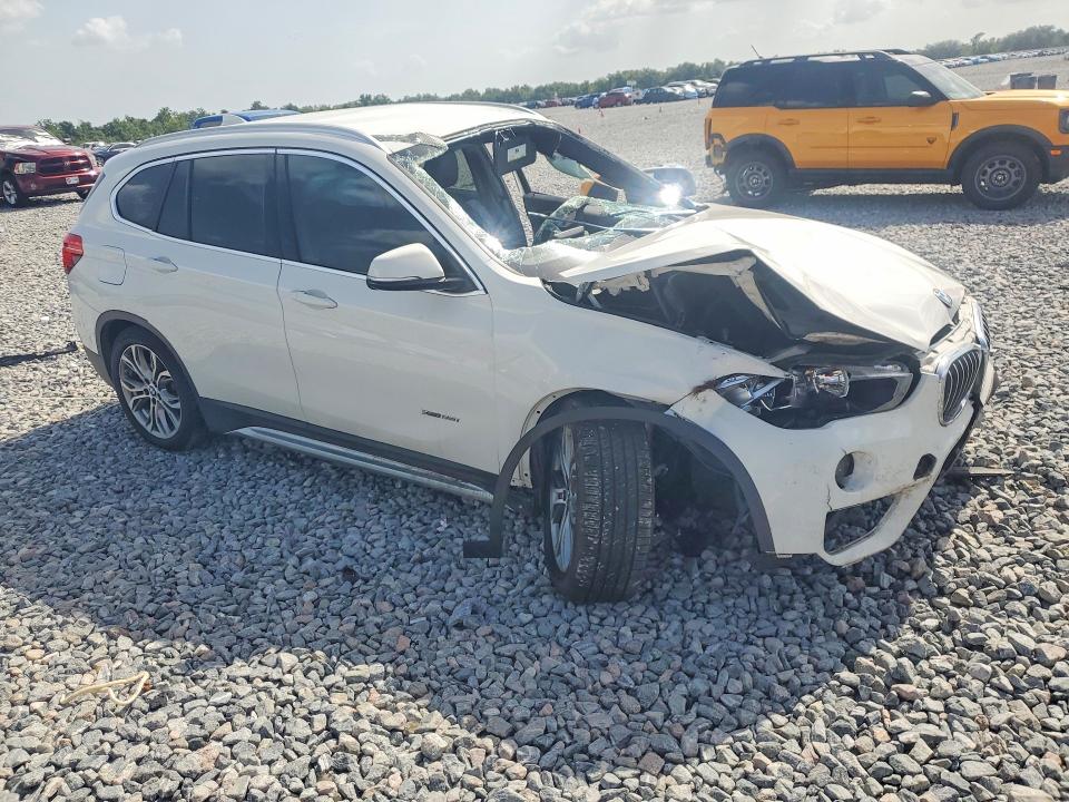 2017 BMW X1 VIN WBXHT3C36H5F73989 COPART salvage auction — ROLLOVER, FL - CERT OF TITLE SLVG REBUILDABLE, sold $750 on 2026-07-31 (photo 4)