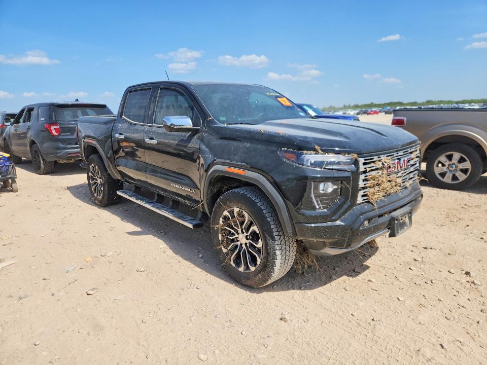 2025 Gmc Canyon VIN 1GTP2FEK2S1200266 COPART salvage auction — WATER/FLOOD, Tx - Salvage Title-Flood Damage, sold $13,300 on 2026-08-20 (photo 4)