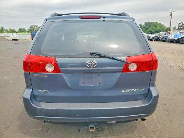 2010 Toyota Sienna VIN 5TDKK4CC9AS305950 COPART salvage auction — REAR END, WA - CERT OF OWNERSHIP-REBUILT, sold $1,500 on 2026-07-15 (photo 6)