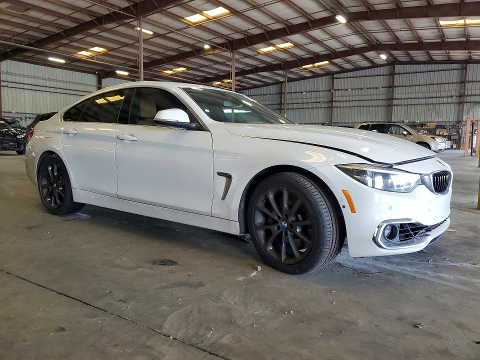 2018 BMW 4er VIN WBA4J7C58JBH14219 COPART salvage auction — WATER/FLOOD, FL - CERT OF TITLE-SLVG REBLD FLOOD, sold $925 on 2026-07-27 (photo 4)