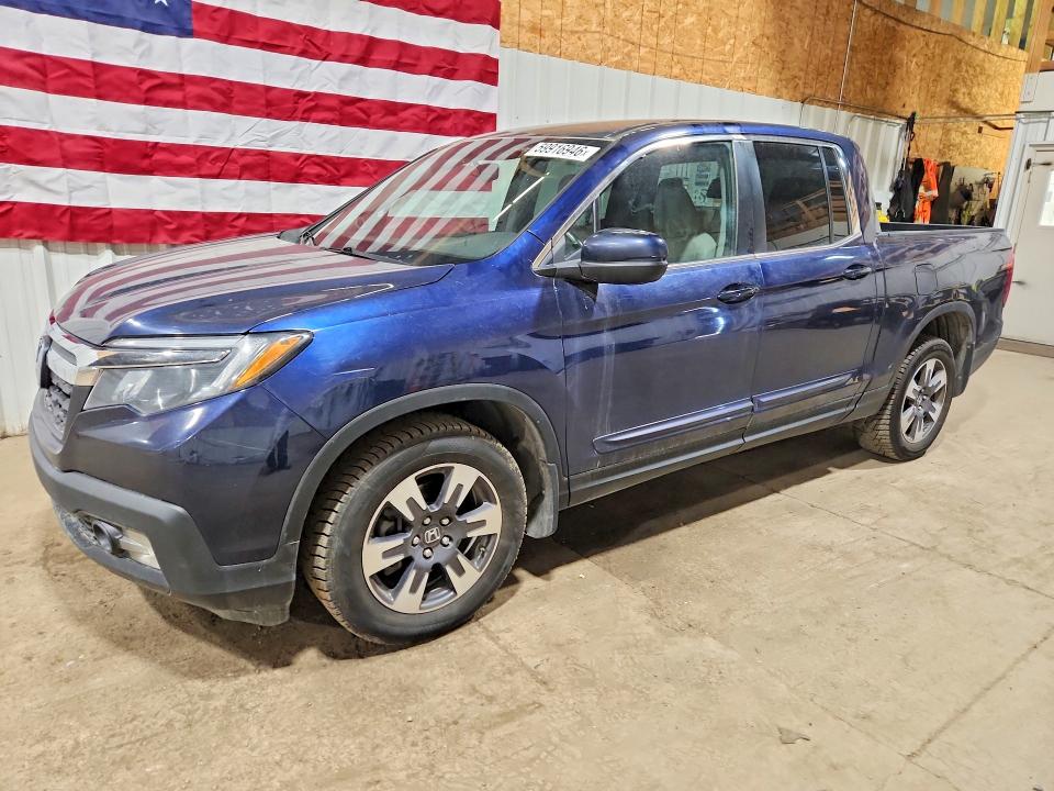 2017 Honda Ridgeline VIN 5FPYK3F67HB011690 — COPART salvage auction photo