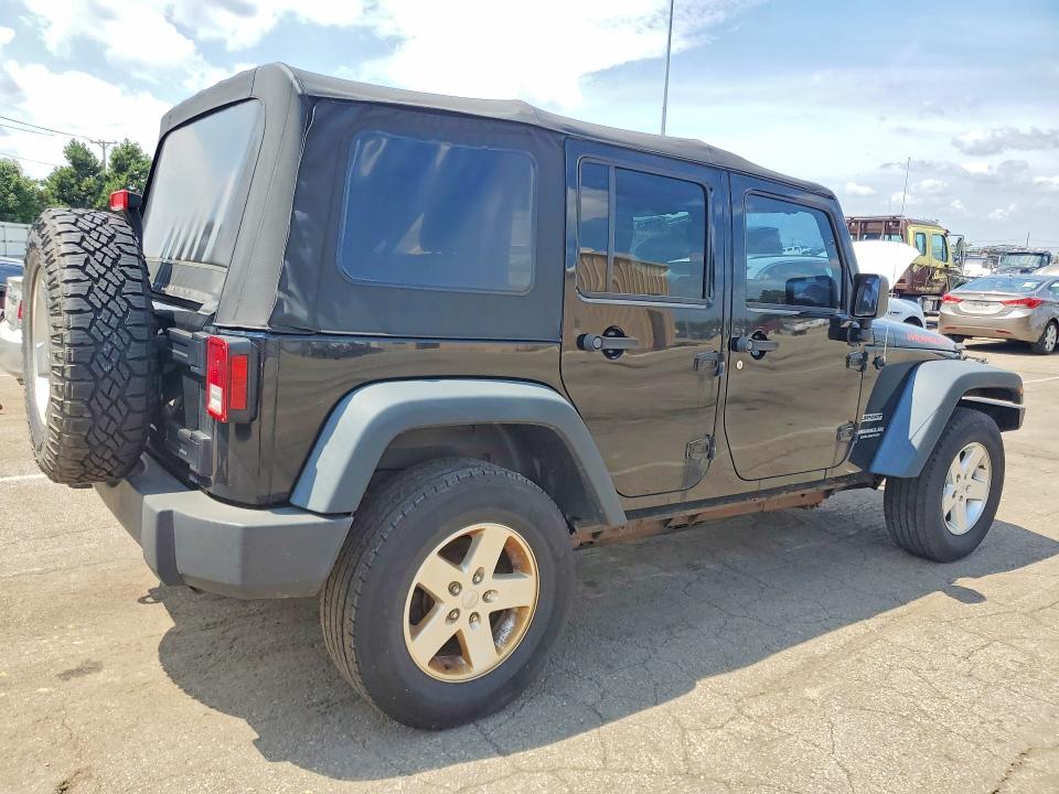2014 Jeep Wrangler / VIN 1C4BJWDG9EL329091 COPART salvage auction — MINOR DENT/SCRATCHES, Oh - Certificate Of Title (P), sold $1,100 on 2026-09-09 (photo 3)