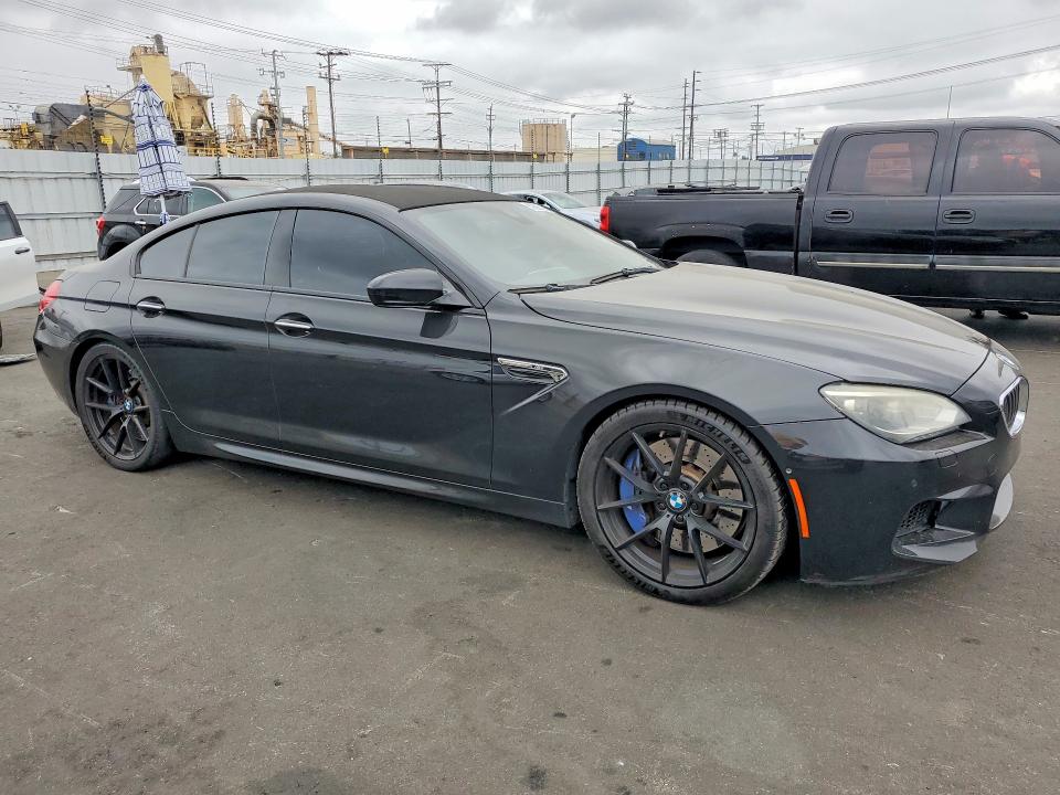 2014 BMW M6 VIN WBS6C9C51ED466705 COPART salvage auction — MINOR DENT/SCRATCHES, Fl - Dis/Dlr/Exp Only Clean Title, sold $4,050 on 2026-07-29 (photo 4)