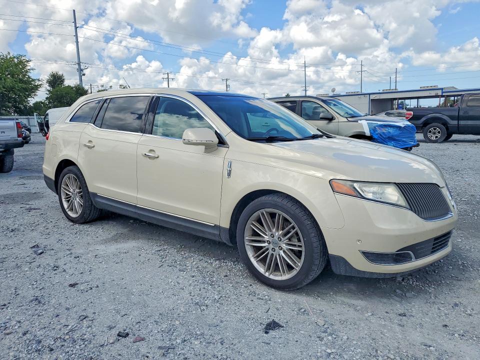 2014 Lincoln Mkt VIN 2LMHJ5ATXEBL53518 COPART salvage auction — MINOR DENT/SCRATCHES, Fl - Certificate Of Title (P), sold $250 on 2026-07-31 (photo 4)