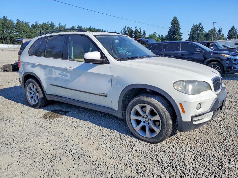 2010 BMW X5 VIN 5UXFE4C58AL381833 COPART salvage auction — MINOR DENT/SCRATCHES, Wa - Aff In Lieu Of Title - Rebuilt, sold $200 on 2026-07-10 (photo 4)