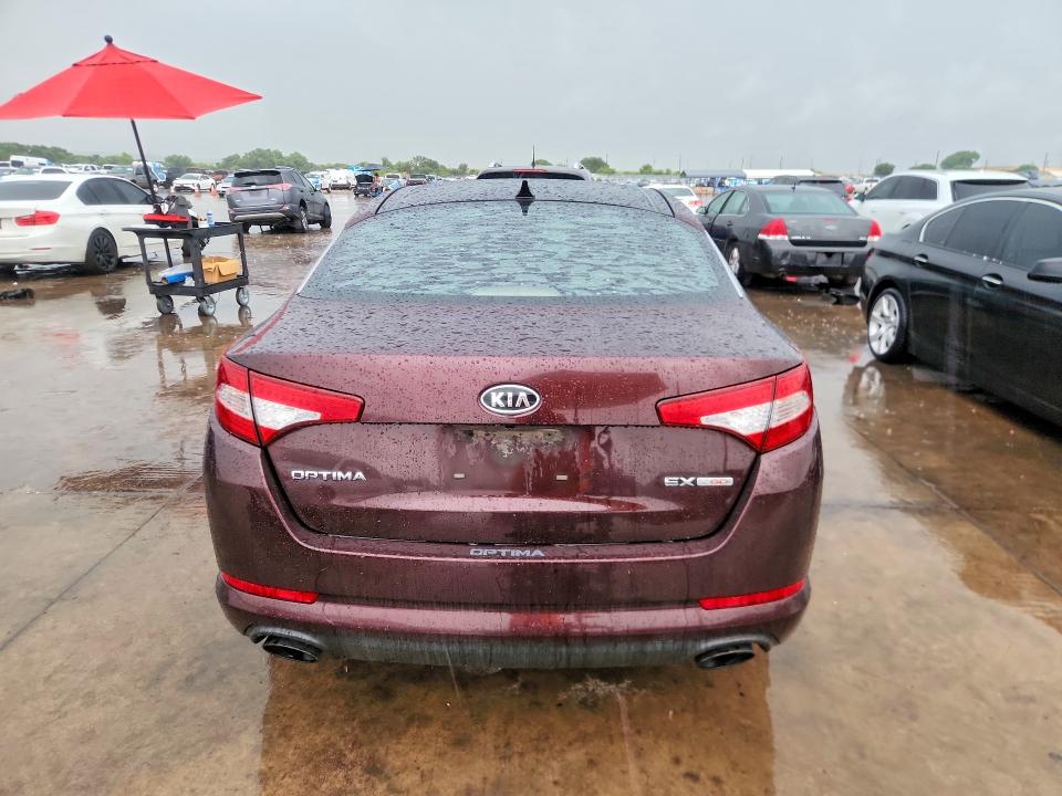 2012 Kia Optima VIN 5XXGN4A60CG038955 COPART salvage auction — NORMAL WEAR, Tx - Certificate Of Title, sold $275 on 2026-07-23 (photo 6)