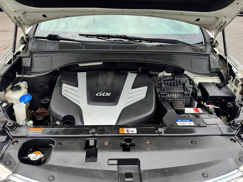 2015 Hyundai Santa fe VIN KM8SRDHF1FU129750 COPART salvage auction — MINOR DENT/SCRATCHES, NH - CERTIFICATE OF TITLE, sold $3,500 on 2026-07-08 (photo 7)
