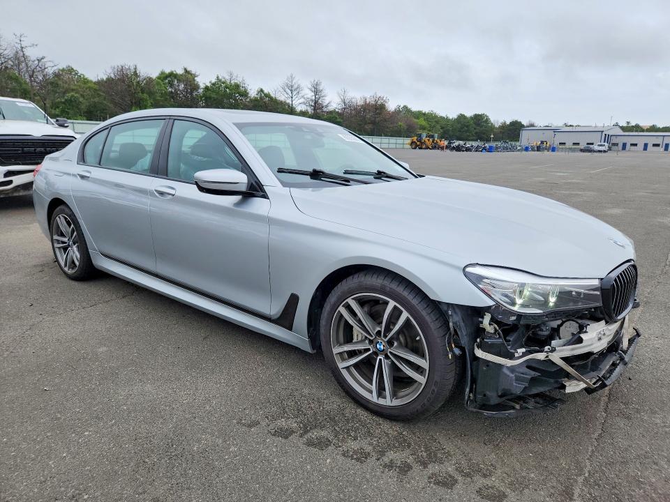2018 BMW 7er VIN WBA7E4C59JGV28091 COPART salvage auction — FRONT END, Ny - Mv-907A Salvage Certificate, sold $80 on 2026-07-27 (photo 4)
