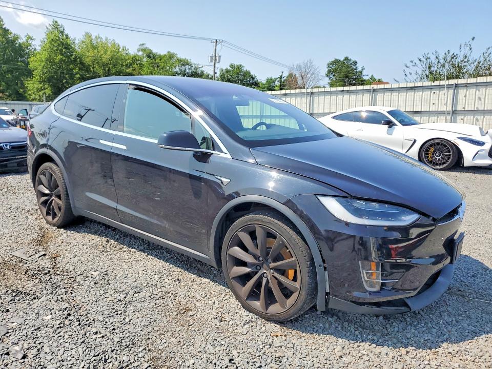 2018 Tesla Model x VIN 5YJXCDE28JF099953 COPART salvage auction — WATER/FLOOD, Nj - Cert Of Title-Salvage Flood, sold $5,800 on 2026-07-31 (photo 4)