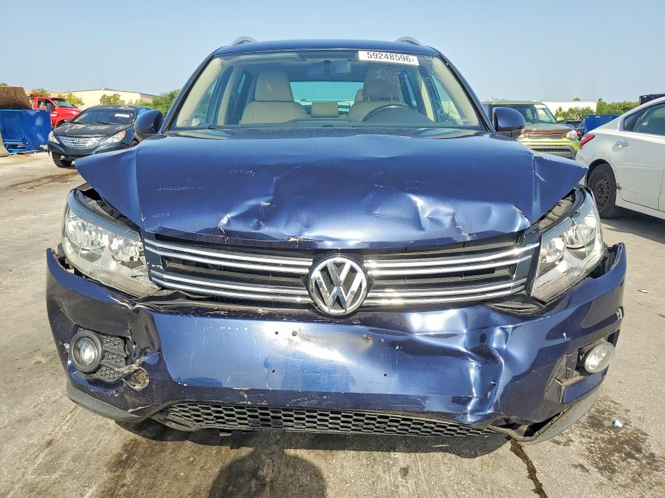2015 Volkswagen Tiguan VIN WVGAV7AX7FW566054 COPART salvage auction — FRONT END, Fl - Cert Of Title Slvg Rebuildable, sold $650 on 2026-07-16 (photo 5)