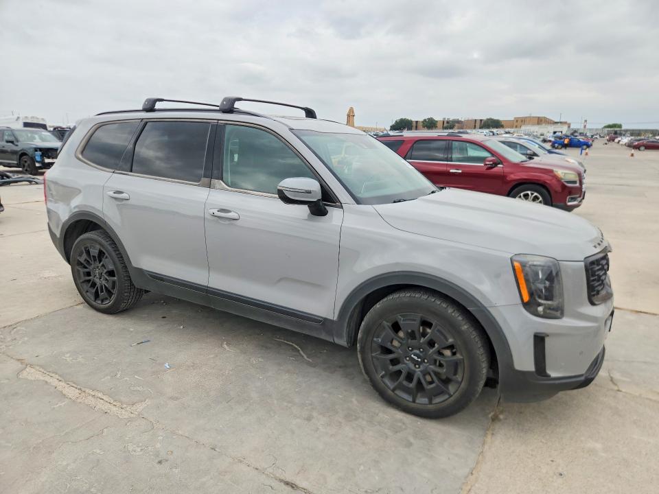 2022 Kia Telluride VIN 5XYP5DHC3NG222023 COPART salvage auction — SIDE, TX - CERTIFICATE OF TITLE, sold $7,200 on 2026-10-08 (photo 4)