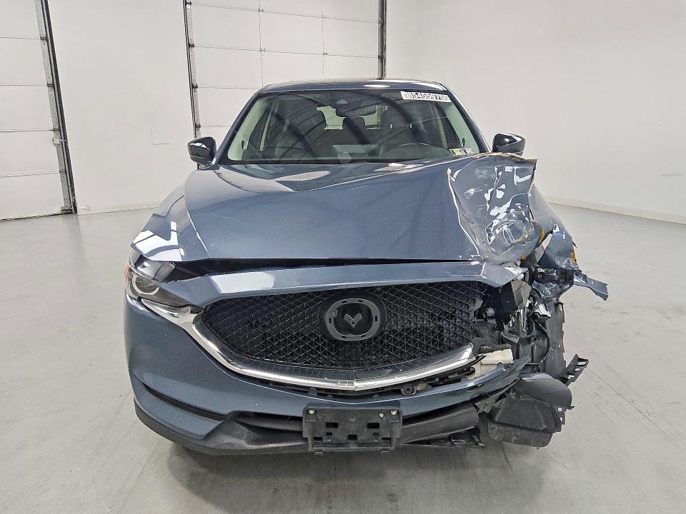 2021 Mazda Cx-5 VIN JM3KFBCM7M0450159 COPART salvage auction — FRONT END, IN - CERTIFICATE OF TITLE (P), sold $6,000 on 2026-09-03 (photo 5)