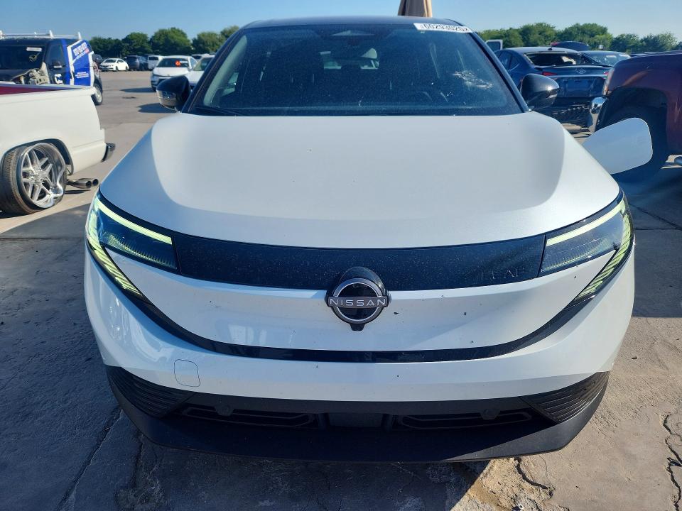 2026 Nissan Leaf VIN JN1AZ2CA2TM302707 COPART salvage auction — UNDERCARRIAGE, Tx - Salvage Vehicle Title, sold $16,700 on 2026-09-14 (photo 5)