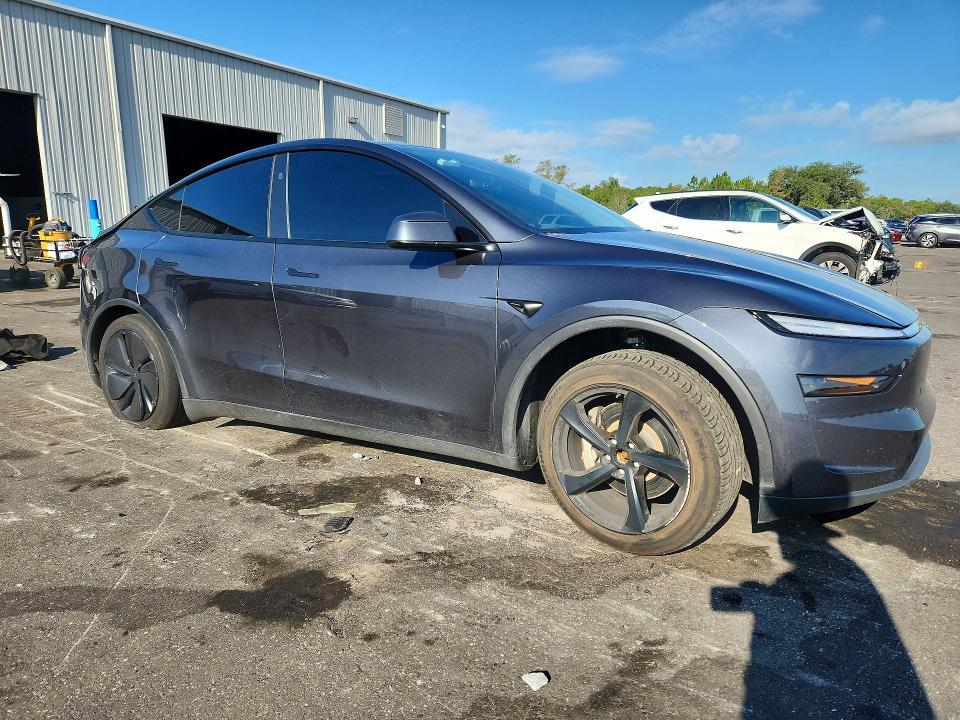 2026 Tesla Model y VIN 7SAYGDEE0TA406263 COPART salvage auction — REAR END, FL - CERTIFICATE OF DESTRUCTION, sold $2,700 on 2026-07-29 (photo 4)