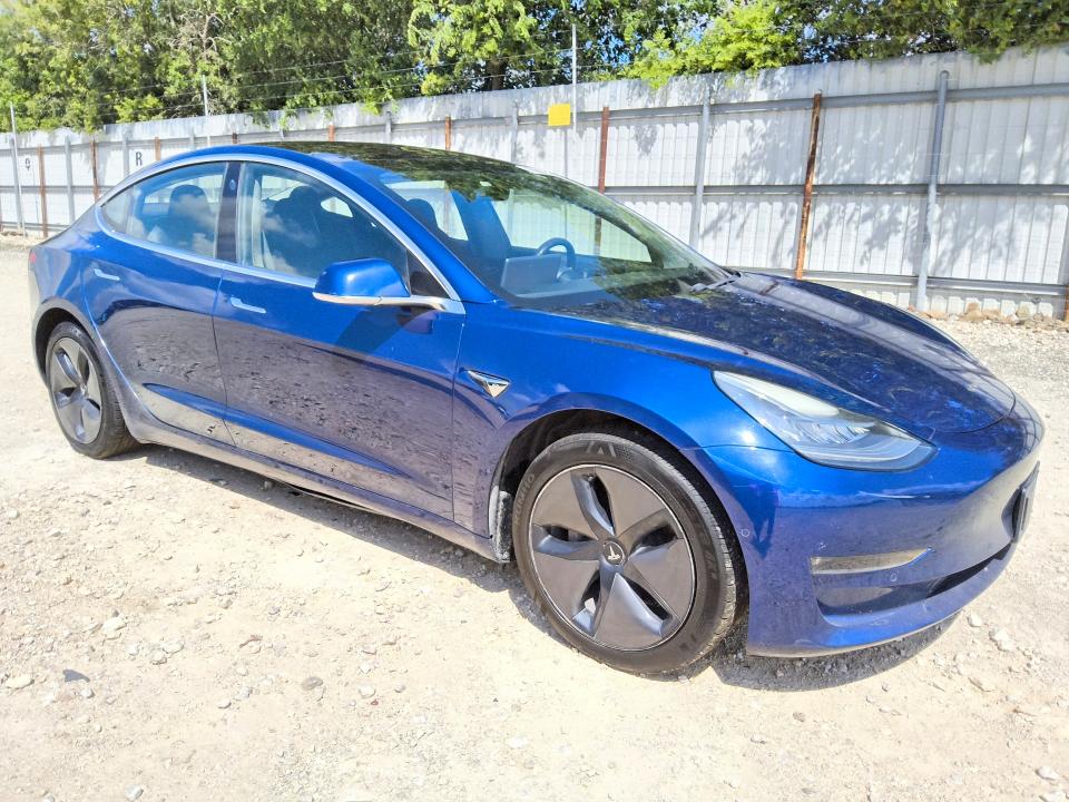 2018 Tesla Model 3 VIN 5YJ3E1EA1JF041715 COPART salvage auction — BURN, TX - CERTIFICATE OF TITLE (P), sold $100 on 2026-07-21 (photo 4)