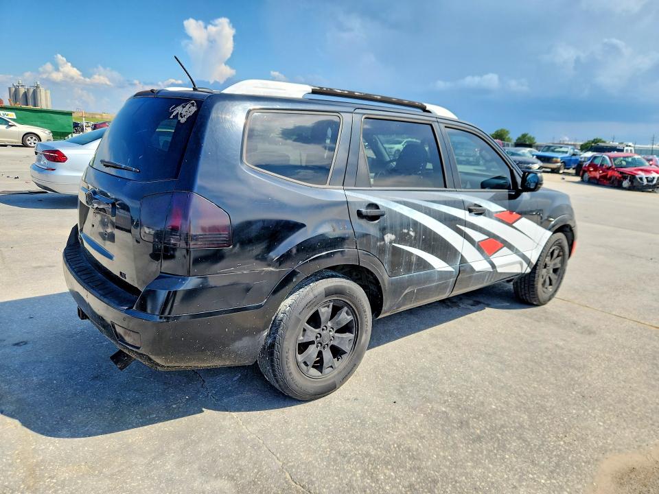 2009 Kia Borrego VIN KNDJJ741X95033097 COPART salvage auction — NORMAL WEAR, LA - CERT OF TITLE-RECONSTRUCTED, sold $250 on 2026-07-29 (photo 3)