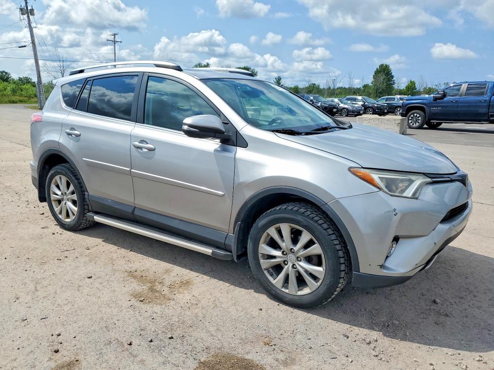 2017 Toyota Rav4 VIN 2T3RFREV6HW686468 COPART salvage auction — MINOR DENT/SCRATCHES, Ny - Cert Of Title-Rebuilt Salvage, sold $11,500 on 2026-08-19 (photo 4)