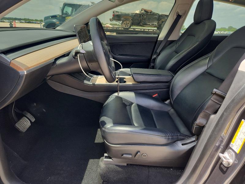 2021 Tesla Model y VIN 5YJYGDEE9MF149038 COPART salvage auction — NORMAL WEAR, TX - CERT OF TITLE-REBUILT SALVAGE, sold $9,900 on 2026-08-03 (photo 7)