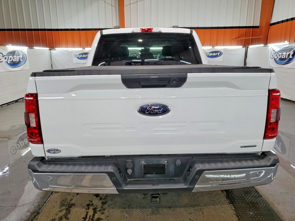 2021 Ford F-150 lightning VIN 1FTFW1E86MFC10845 COPART salvage auction — MINOR DENT/SCRATCHES, AB - BOS - ACTIVE, sold $9,100 on 2026-07-29 (photo 6)