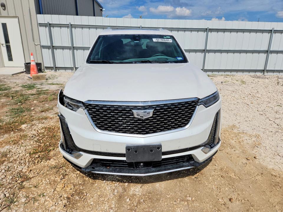 2024 Cadillac Xt6 VIN 1GYKPCRS7RZ719288 COPART salvage auction — SIDE, Tx - Salvage Vehicle Title, sold $2,550 on 2026-07-09 (photo 5)