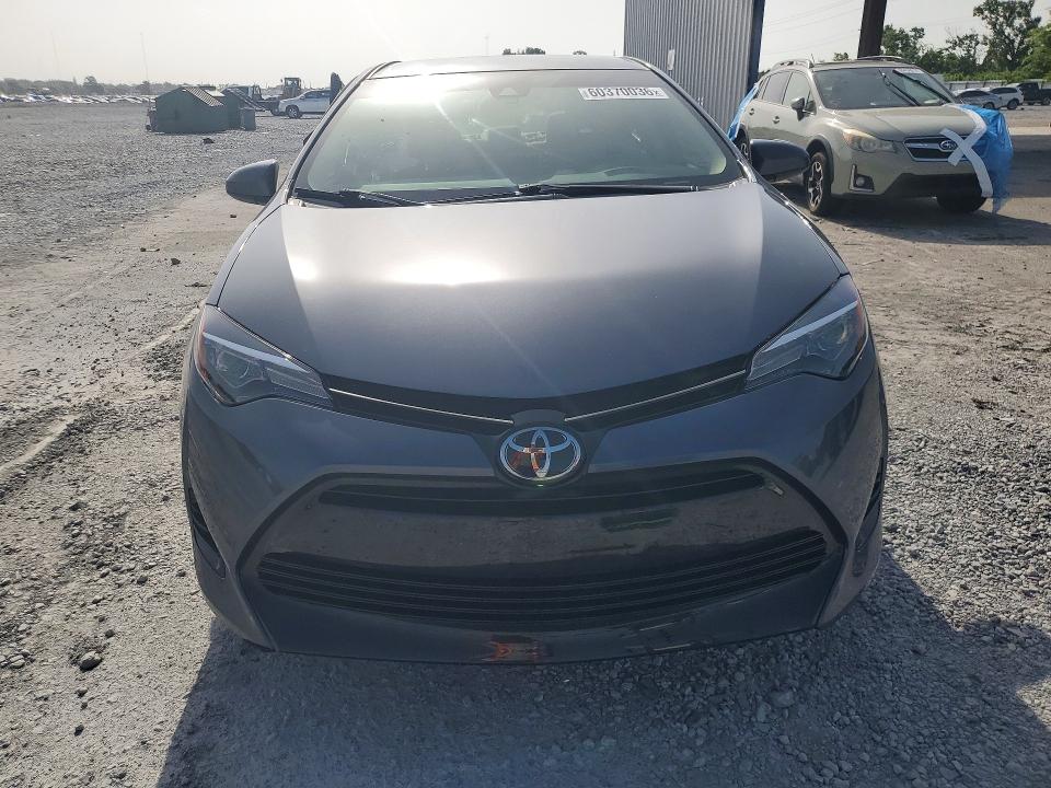 2017 Toyota Corolla VIN 5YFBURHE6HP732555 COPART salvage auction — SIDE, Fl - Certificate Of Destruction, sold $2,300 on 2026-07-31 (photo 5)