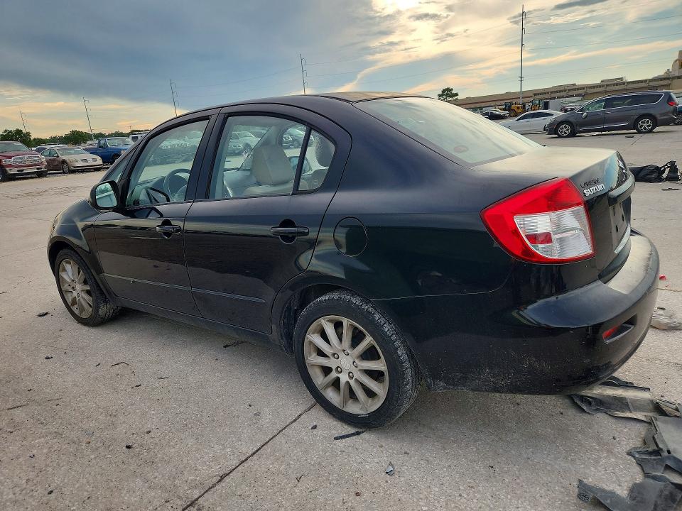 2011 Suzuki Sx4 VIN JS2YC5A21B6303012 COPART salvage auction — MINOR DENT/SCRATCHES, La - Certificate Of Title (P), sold $750 on 2026-07-29 (photo 2)
