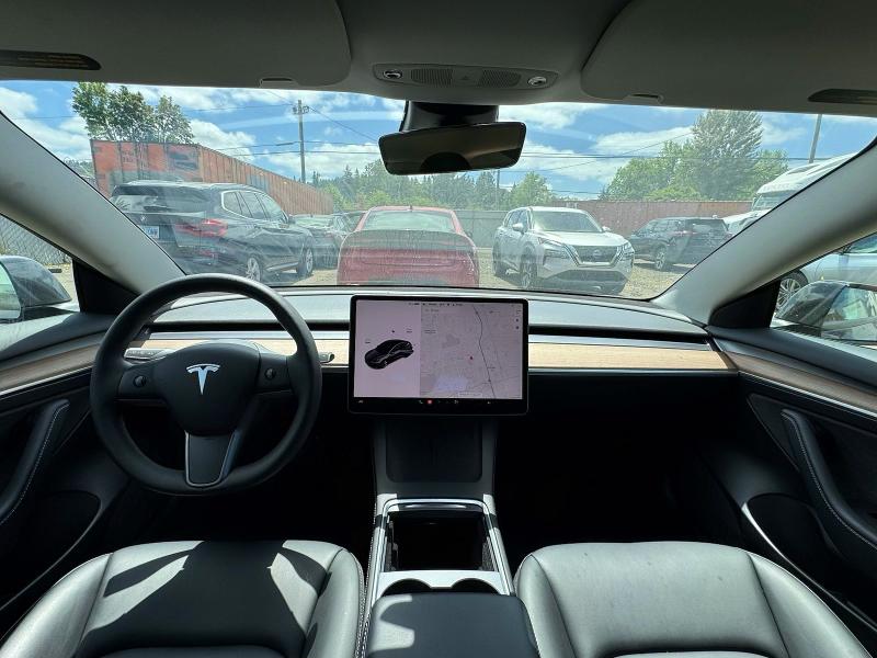 2022 Tesla Model 3 VIN 5YJ3E1EA5NF185418 COPART salvage auction — NORMAL WEAR, OR - CERTIFICATE OF TITLE (P), sold $22,300 on 2026-07-28 (photo 9)