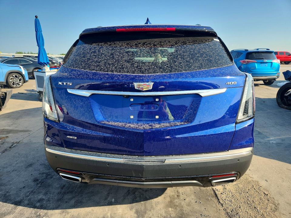 2023 Cadillac VIN 1GYKNGRS2PZ120650 COPART salvage auction — FRONT END, Tx - Salvage Vehicle Title, sold $7,100 on 2026-09-08 (photo 6)