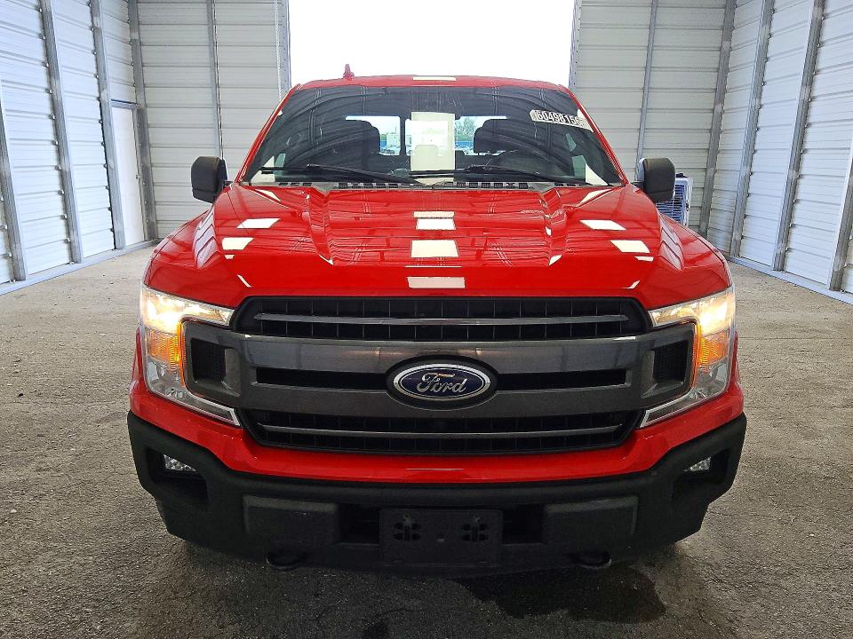2018 Ford F-150 lightning VIN 1FTFW1EG6JFE20381 COPART salvage auction — MINOR DENT/SCRATCHES, FL - CERTIFICATE OF TITLE, sold $8,700 on 2026-08-25 (photo 5)