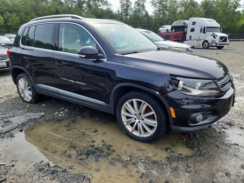 2014 Volkswagen Tiguan VIN WVGAV3AXXEW608871 COPART salvage auction — FRONT END, MD - CERTIFICATE OF TITLE, sold $900 on 2026-08-16 (photo 4)