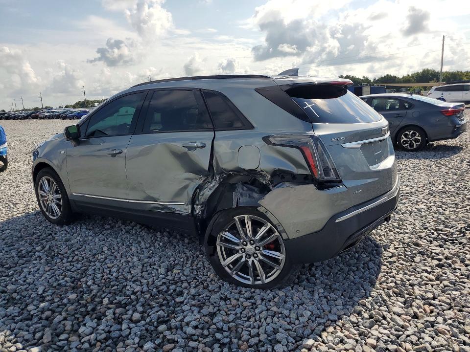 2023 Cadillac Xt5 VIN 1GYKNGRS1PZ118159 COPART salvage auction — SIDE, Fl - Certificate Of Destruction, sold $7,300 on 2026-08-18 (photo 2)