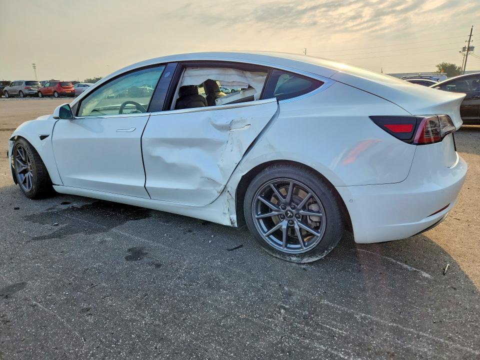 2020 Tesla Model 3 VIN 5YJ3E1EA2LF785231 COPART salvage auction — FRONT END, Fl - Cert Of Title Slvg Rebuildable, sold $4,750 on 2026-09-03 (photo 2)