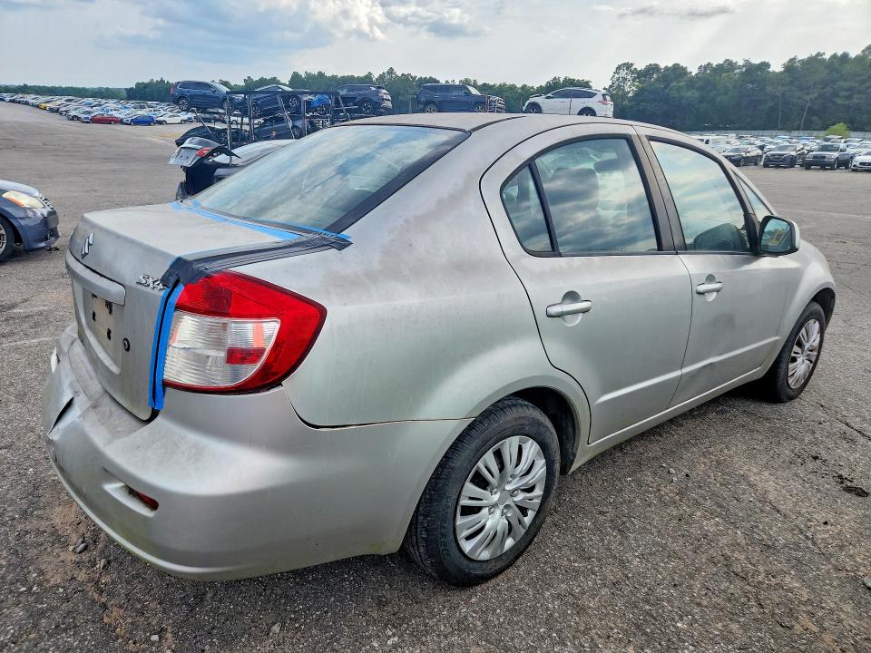 2011 Suzuki Sx4 VIN JS2YC5A26B6300770 COPART salvage auction — MINOR DENT/SCRATCHES, Al - Cert Of Title-Salvage Title, sold $225 on 2026-09-28 (photo 3)