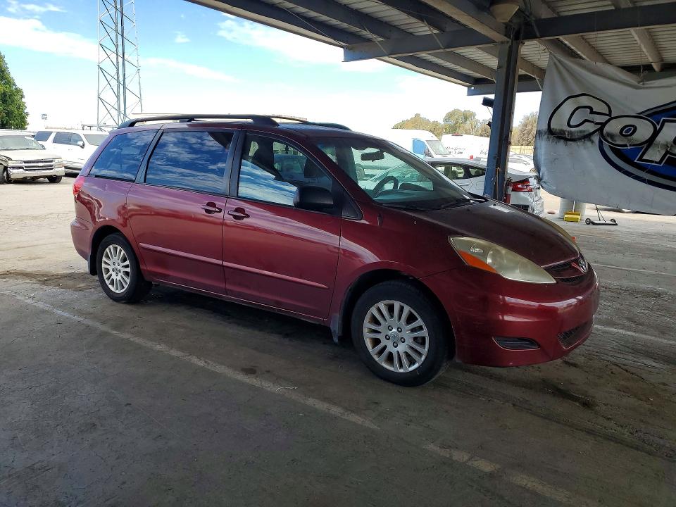 2010 Toyota Sienna VIN 5TDKK4CC3AS314076 COPART salvage auction — MINOR DENT/SCRATCHES, CA - DIS/DLR/EXP APP FOR DUP CLEAN, sold $30 on 2026-07-28 (photo 4)