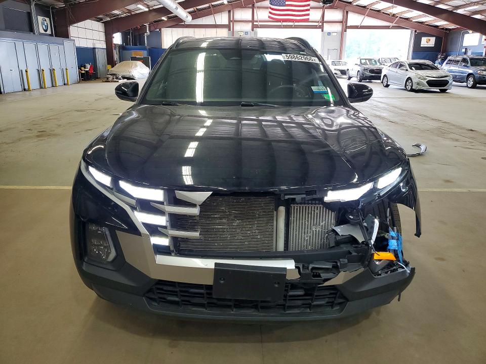 2022 Hyundai Santa cruz VIN 5NTJDDAF0NH013507 COPART salvage auction — FRONT END, Fl - Certificate Of Title (P), sold $18,500 on 2026-07-30 (photo 5)