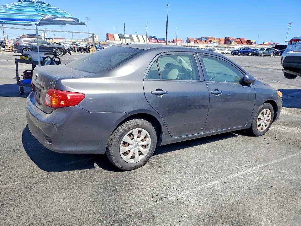 2009 Toyota Corolla VIN JTDBL40E599021289 COPART salvage auction — NORMAL WEAR, Fl - Dis/Dlr/Exp Only Clean Title, sold $2,050 on 2026-07-29 (photo 3)