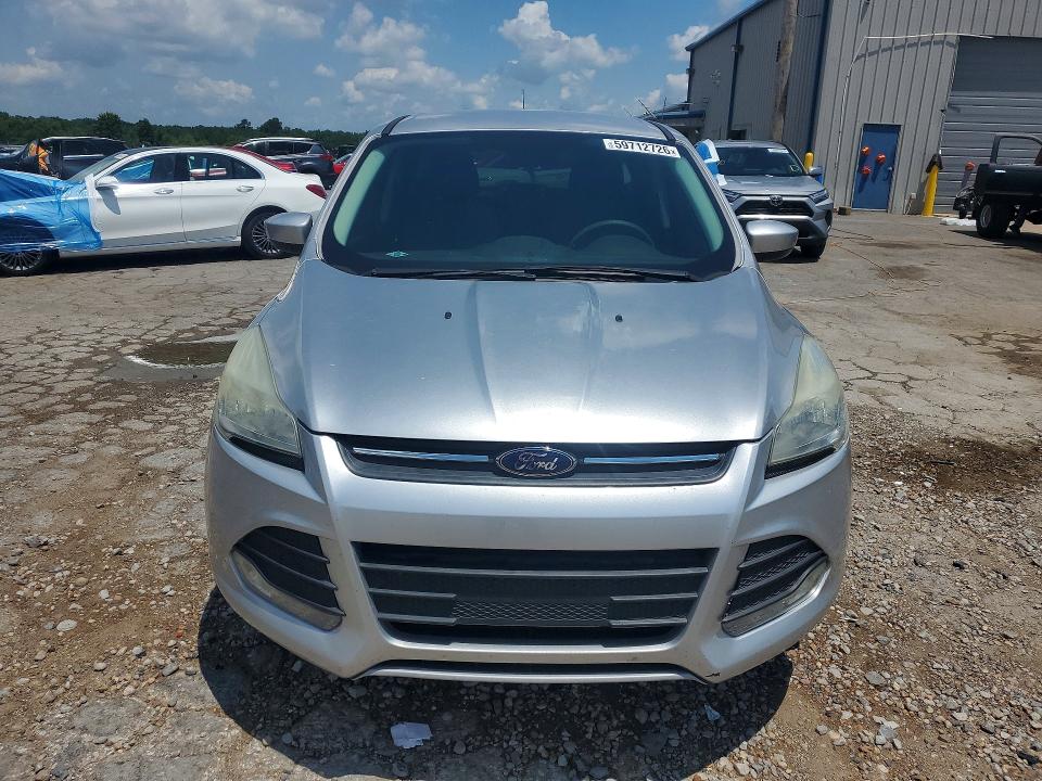 2016 Ford Escape VIN 1FMCU9GX3GUC81525 COPART salvage auction — NORMAL WEAR, Mt - Certificate Of Title, sold $1,250 on 2026-07-22 (photo 5)