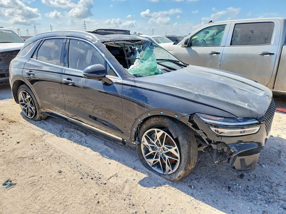 2023 Genesis Gv70 VIN KMUMADTB4PU138675 COPART salvage auction — ROLLOVER, Tx - Salvage Vehicle Title (P), sold $3,950 on 2026-07-10 (photo 4)