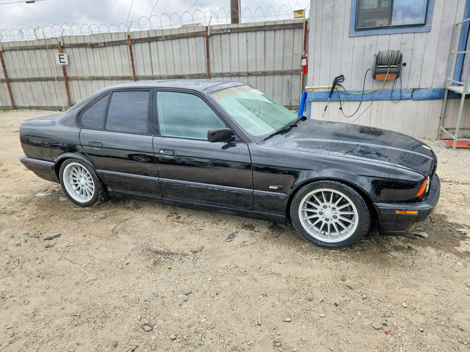 1995 BMW 5 series VIN WBAHE632XSGF31141 COPART salvage auction — NORMAL WEAR, CA - DIS/DLR/EXP ONLY CLEAN TITLE (P), sold $7,500 on 2026-07-13 (photo 4)
