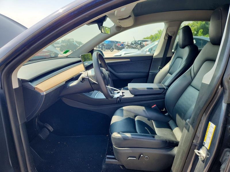2023 Tesla Model y VIN 7SAYGDEF5PA049323 COPART salvage auction — NORMAL WEAR, MO - CERTIFICATE OF TITLE, sold $9,000 on 2026-07-28 (photo 7)