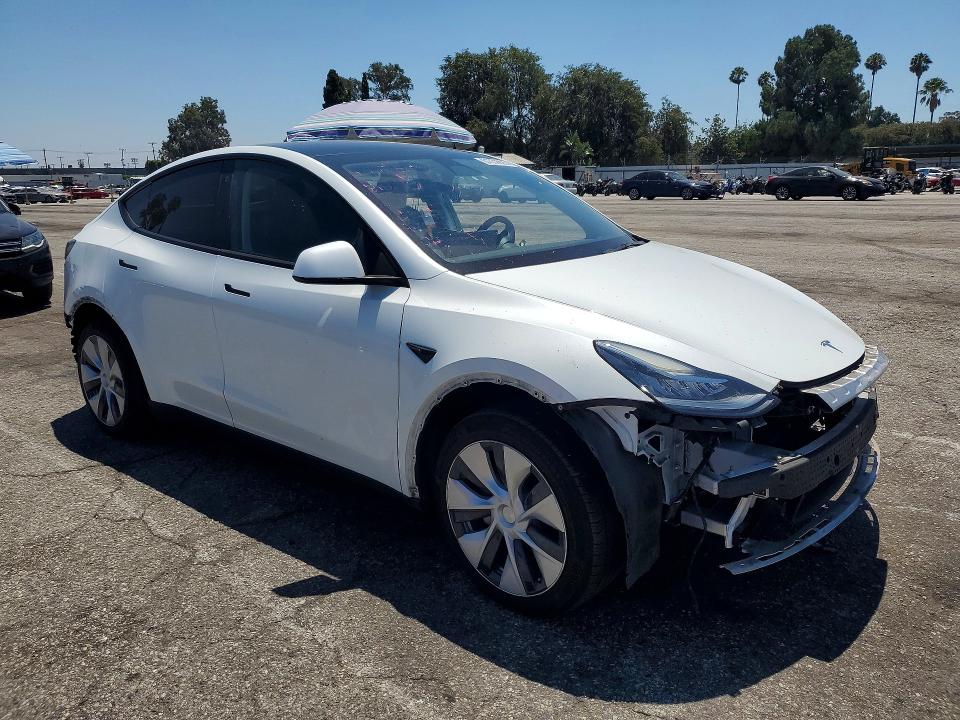 2022 Tesla Model y VIN 7SAYGAEE9NF465526 COPART salvage auction — SIDE, Ca - Salvage Certificate, sold $8,200 on 2026-08-28 (photo 4)