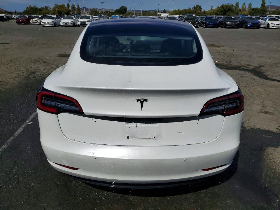 2018 Tesla Model 3 VIN 5YJ3E1EA1JF013218 COPART salvage auction — MINOR DENT/SCRATCHES, Ca - Certificate Of Title, sold $17,007 on 2026-09-01 (photo 6)