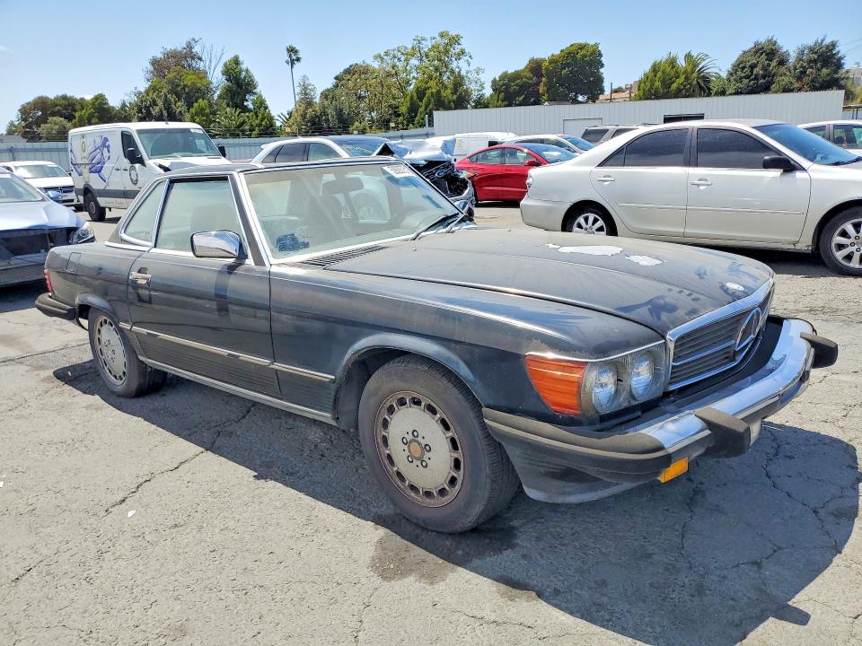 1989 Mercedes-benz 560 VIN WDBBA48D9KA094430 COPART salvage auction — MINOR DENT/SCRATCHES, FL - DIS/DLR/EXP ONLY CLEAN TITLE, sold $3,550 on 2026-07-31 (photo 4)