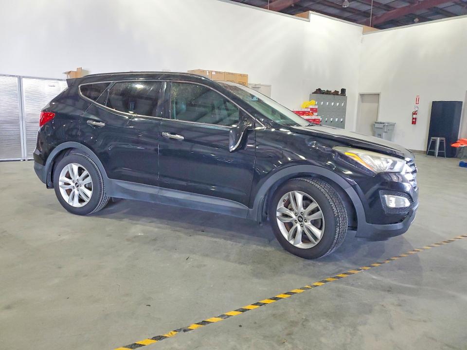 2016 Hyundai Santa fe VIN 5XYZW4LA5GG346485 COPART salvage auction — WATER/FLOOD, Fl - Cert Of Title-Slvg Rebld Flood, sold $800 on 2026-07-20 (photo 4)