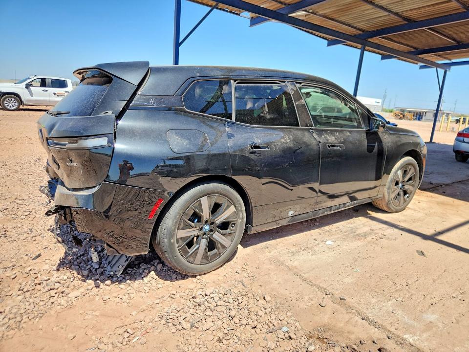 2025 BMW Ix VIN WB523CF07SCT06571 COPART salvage auction — REAR END, Salvage Title, sold $17,000 on 2026-08-25 (photo 3)