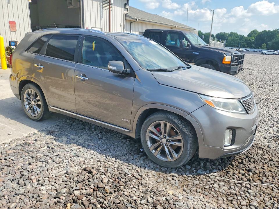 2014 Kia Sorento VIN 5XYKWDA74EG499946 COPART salvage auction — NORMAL WEAR, Mo - Certificate Of Title, sold $70 on 2026-07-21 (photo 4)