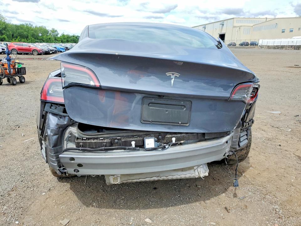2023 Tesla Model 3 VIN 5YJ3E1EA4PF687243 COPART salvage auction — REAR END, CT - CERT OF TITLE-SALVAGE, sold $3,700 on 2026-07-28 (photo 6)