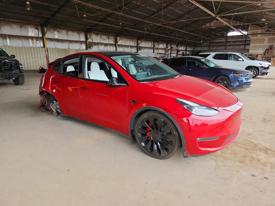 2022 Tesla Model y VIN 7SAYGDEF3NF558018 COPART salvage auction — REAR END, AZ - CERT OF TITLE - SALVAGE, sold $5,800 on 2026-09-10 (photo 4)